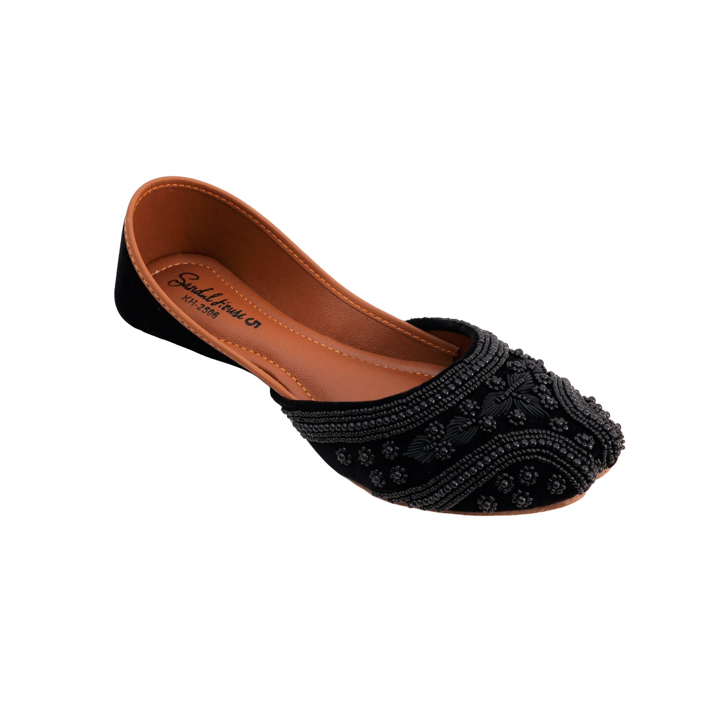 Black beaded flat shoe on a white background